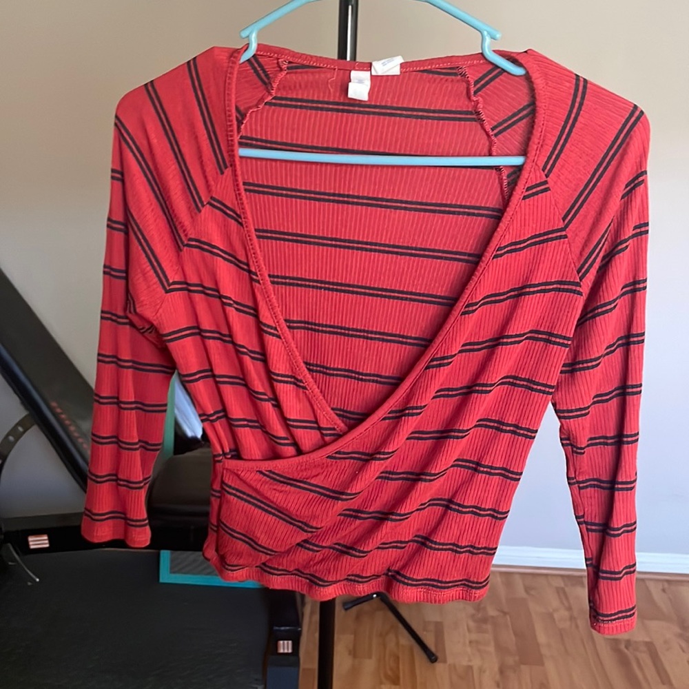 Barely worn (once) Tillys red and black striped half sleeve. No stains or nicks.